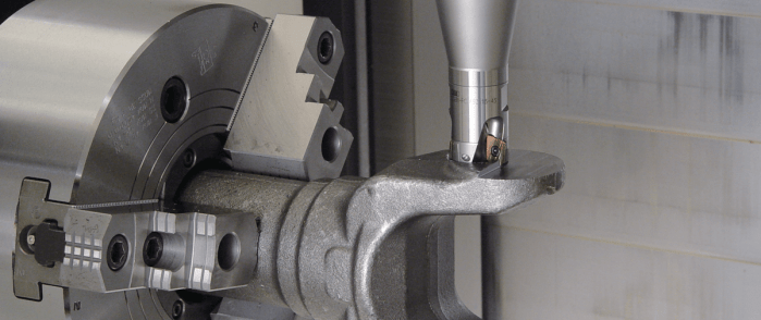 A Fullcut Mill with Contact Grip machining a workpiece.