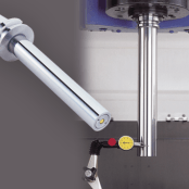 Dyna Test bar measuring a spindle with a dial indicator.